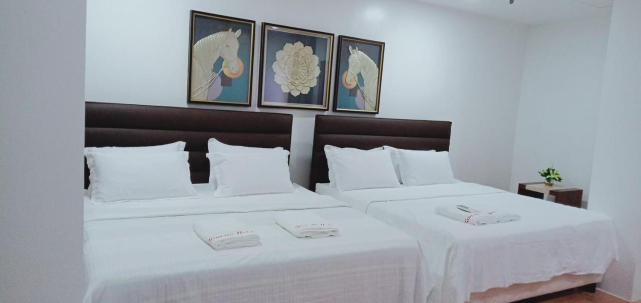 Tam-An Hotel Банаю Экстерьер фото